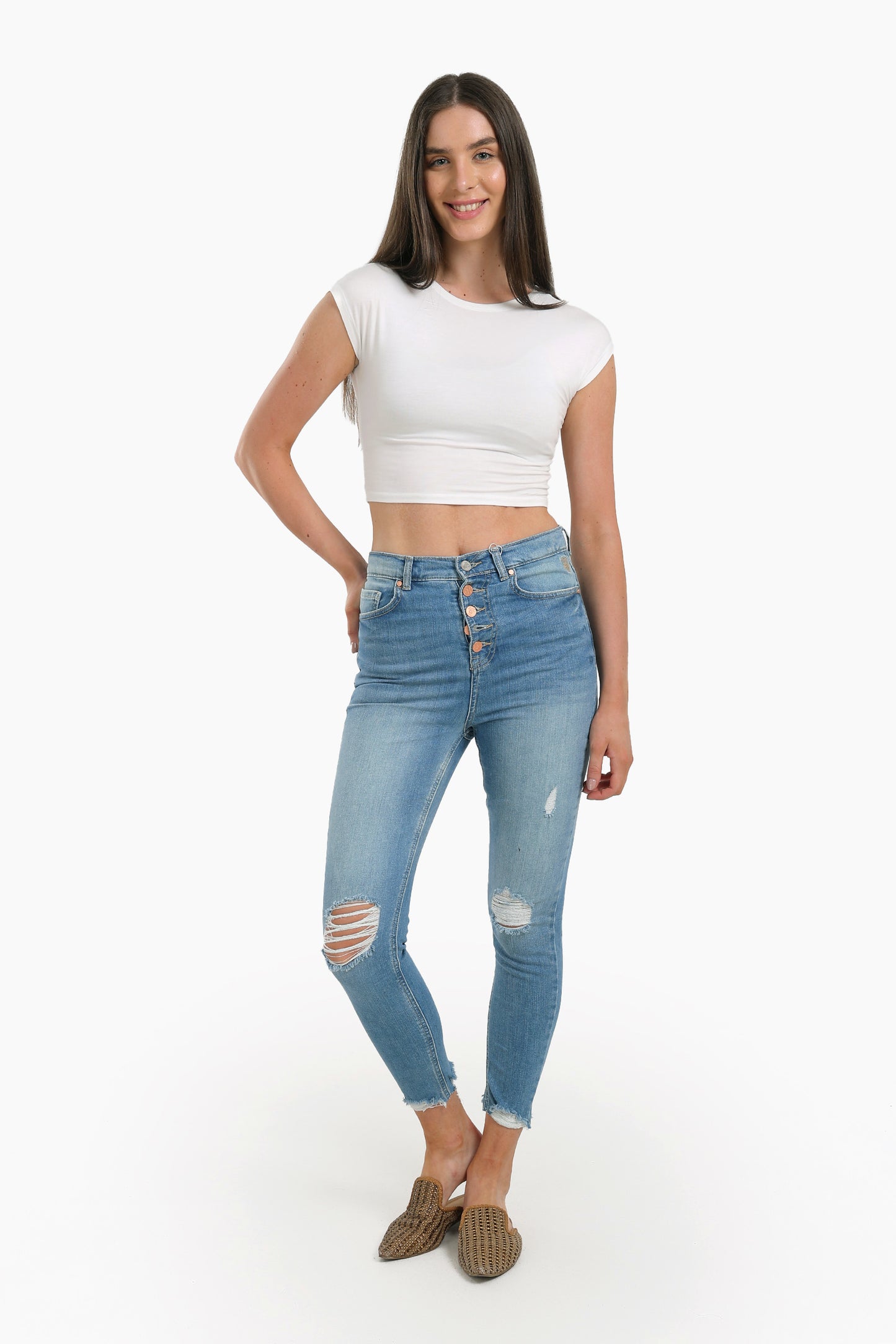 جينز سكينّي بطول الكاحل